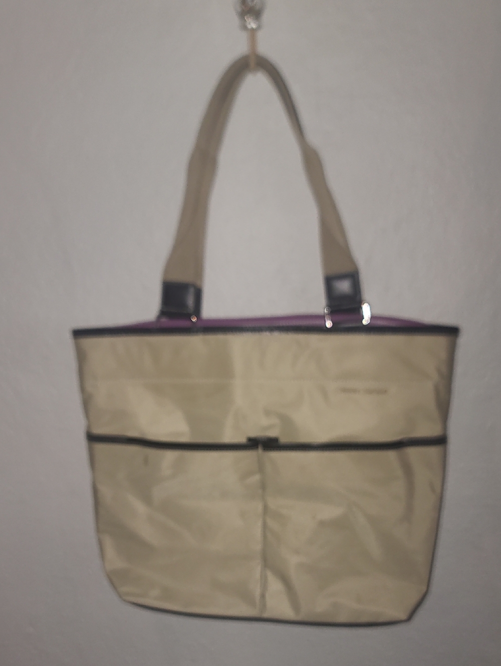 Tommy Hilfiger nylon tote bag featuring a khaki or tan exterior.